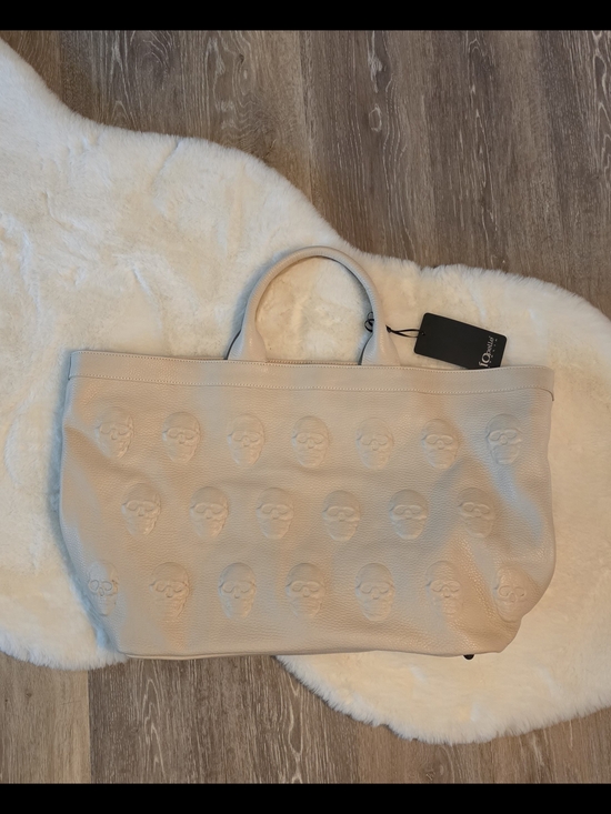 io pelle Handbags - IO Pelle Embossed Skull Tote Bag in Cream NWT